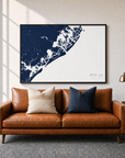 Atlantic City canvas map — two-pillow black-frame sofa interior