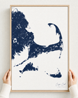 Cape Cod canvas map — hands holding the canvas in an oak frame