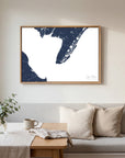 Cape May navy horizontal canvas map in an oak framed room scene