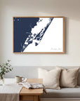 Chincoteague Island navy horizontal canvas map in an oak framed room scene