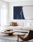 First Coast navy horizontal canvas map in an oak framed room scene