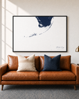 Florida Keys canvas map — two-pillow black-frame sofa interior