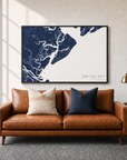 Hilton Head Island canvas map — two-pillow black-frame sofa interior