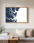 Jekyll Island navy horizontal canvas map in an oak framed room scene