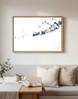 Key West navy horizontal canvas map in an oak framed room scene