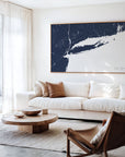Long Island navy horizontal canvas map in an oak framed room scene