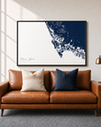 Marco Island canvas map — two-pillow black-frame sofa interior