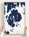 Mount Desert canvas map — hands holding the canvas in an oak frame