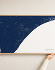 Myrtle Beach canvas map — hands holding the canvas in an oak frame
