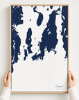 Newport canvas map — hands holding the canvas in an oak frame
