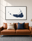 Nantucket horizontal canvas map in Navy, black-framed canvas above a sofa