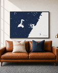 Portsmouth canvas map — two-pillow black-frame sofa interior
