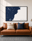 Southern Maine Coast canvas map — two-pillow black-frame sofa interior