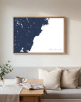 Southern Maine Coast navy horizontal canvas map in an oak framed room scene
