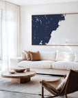 Southern Maine Coast navy horizontal canvas map in an oak framed room scene