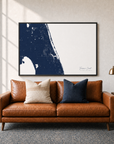 Treasure Coast canvas map — two-pillow black-frame sofa interior