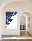 Tybee Island navy vertical canvas map in the Bello mixed room scene