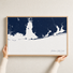 Alabama Gulf Coast canvas map — hands holding the canvas in an oak frame
