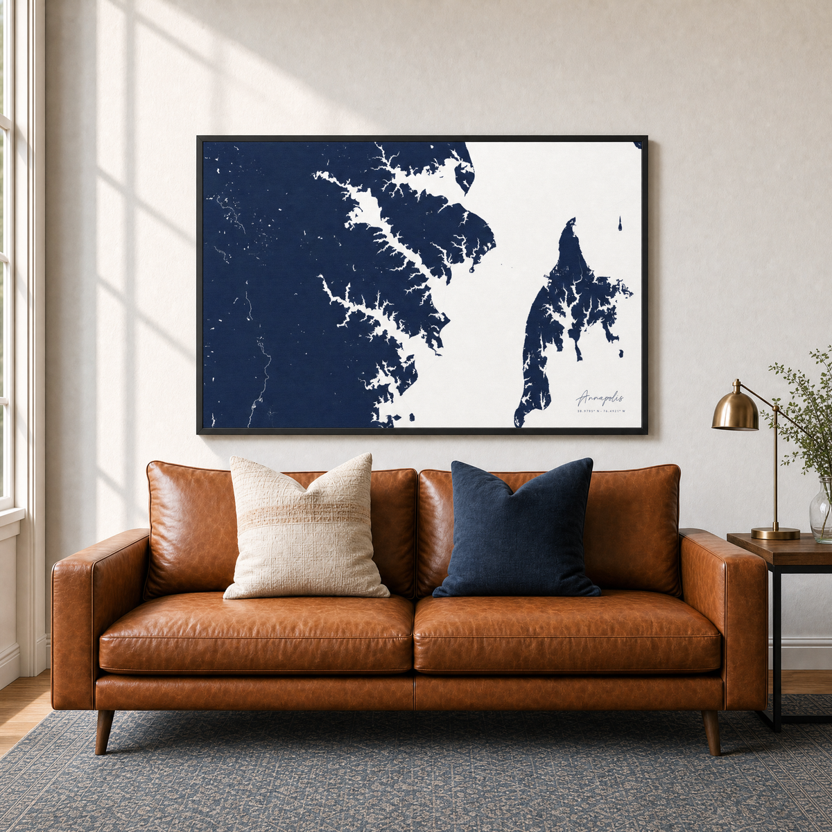 Annapolis canvas map — two-pillow black-frame sofa interior