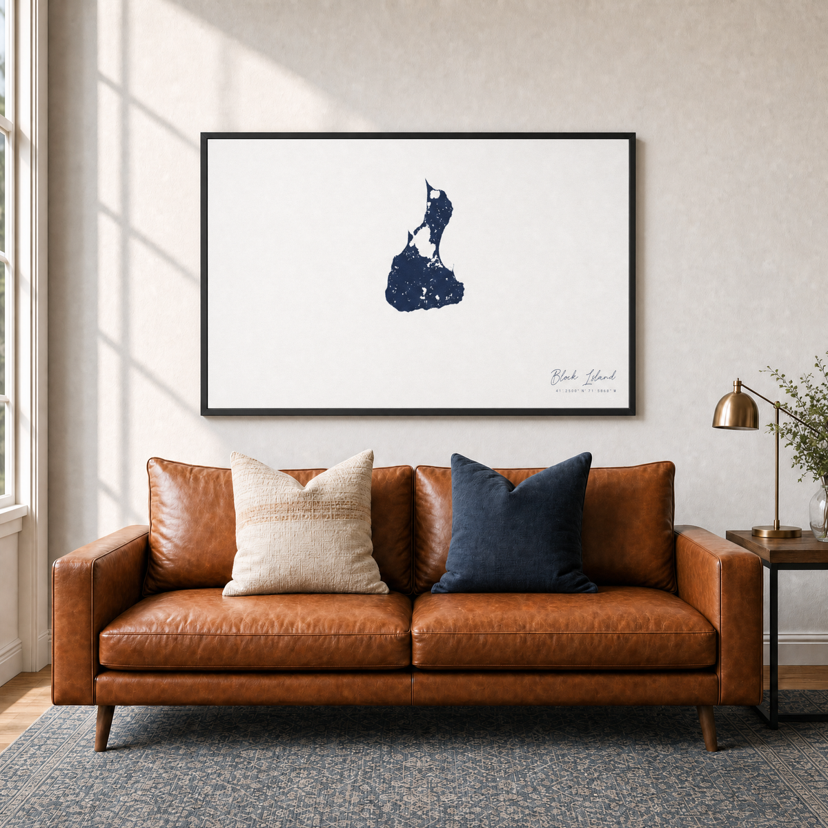 Block Island canvas map — two-pillow black-frame sofa interior