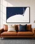 Brunswick Islands canvas map — two-pillow black-frame sofa interior