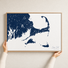Cape Cod canvas map — hands holding the canvas in an oak frame