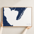 Cape May canvas map — hands holding the canvas in an oak frame