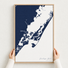 Chincoteague Island canvas map — hands holding the canvas in an oak frame