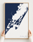 Chincoteague Island canvas map — hands holding the canvas in an oak frame
