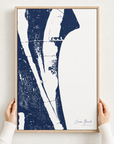 Cocoa Beach canvas map — hands holding the canvas in an oak frame