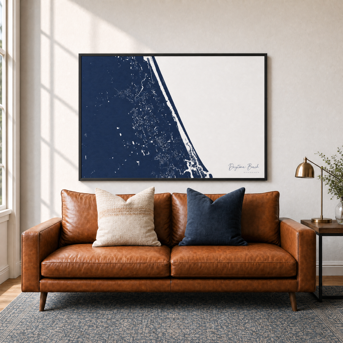Daytona Beach canvas map — two-pillow black-frame sofa interior