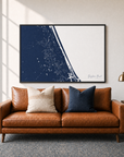 Daytona Beach canvas map — two-pillow black-frame sofa interior