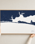 Destin canvas map — hands holding the canvas in an oak frame