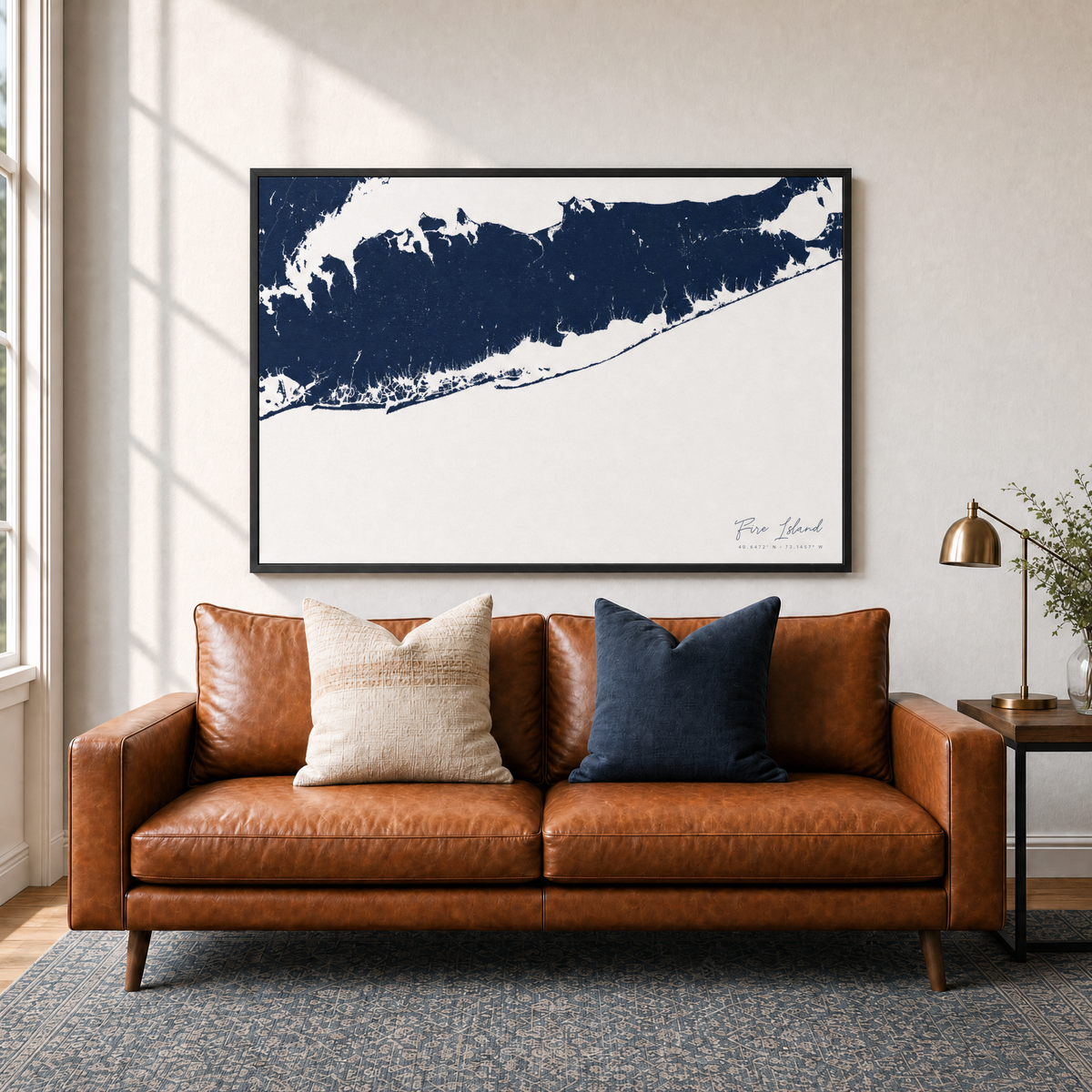 Fire Island canvas map — two-pillow black-frame sofa interior