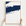 Fire Island canvas map — hands holding the canvas in an oak frame