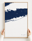 Fire Island canvas map — hands holding the canvas in an oak frame