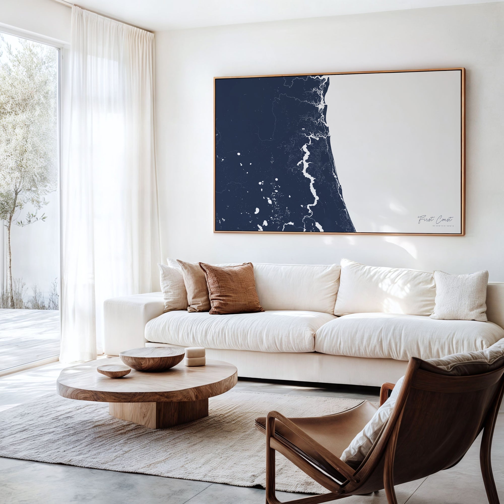 First Coast navy horizontal canvas map in an oak framed room scene