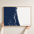 First Coast / Northeast Florida canvas map — hands holding the canvas in an oak frame