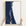 First Coast / Northeast Florida canvas map — hands holding the canvas in an oak frame