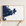 Gloucester canvas map — hands holding the canvas in an oak frame