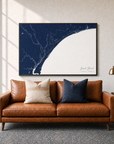 Grand Strand canvas map — two-pillow black-frame sofa interior