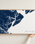 Hilton Head Island canvas map — hands holding the canvas in an oak frame
