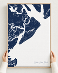 Hilton Head Island canvas map — hands holding the canvas in an oak frame