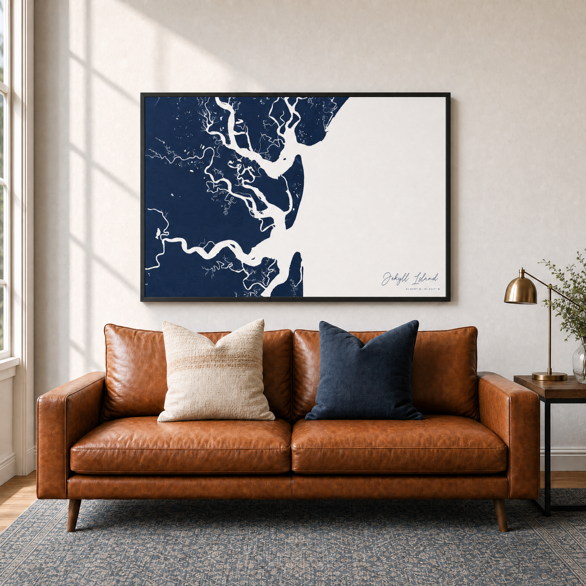 Jekyll Island canvas map — two-pillow black-frame sofa interior