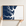 Jekyll Island canvas map — hands holding the canvas in an oak frame