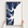 Jekyll Island canvas map — hands holding the canvas in an oak frame