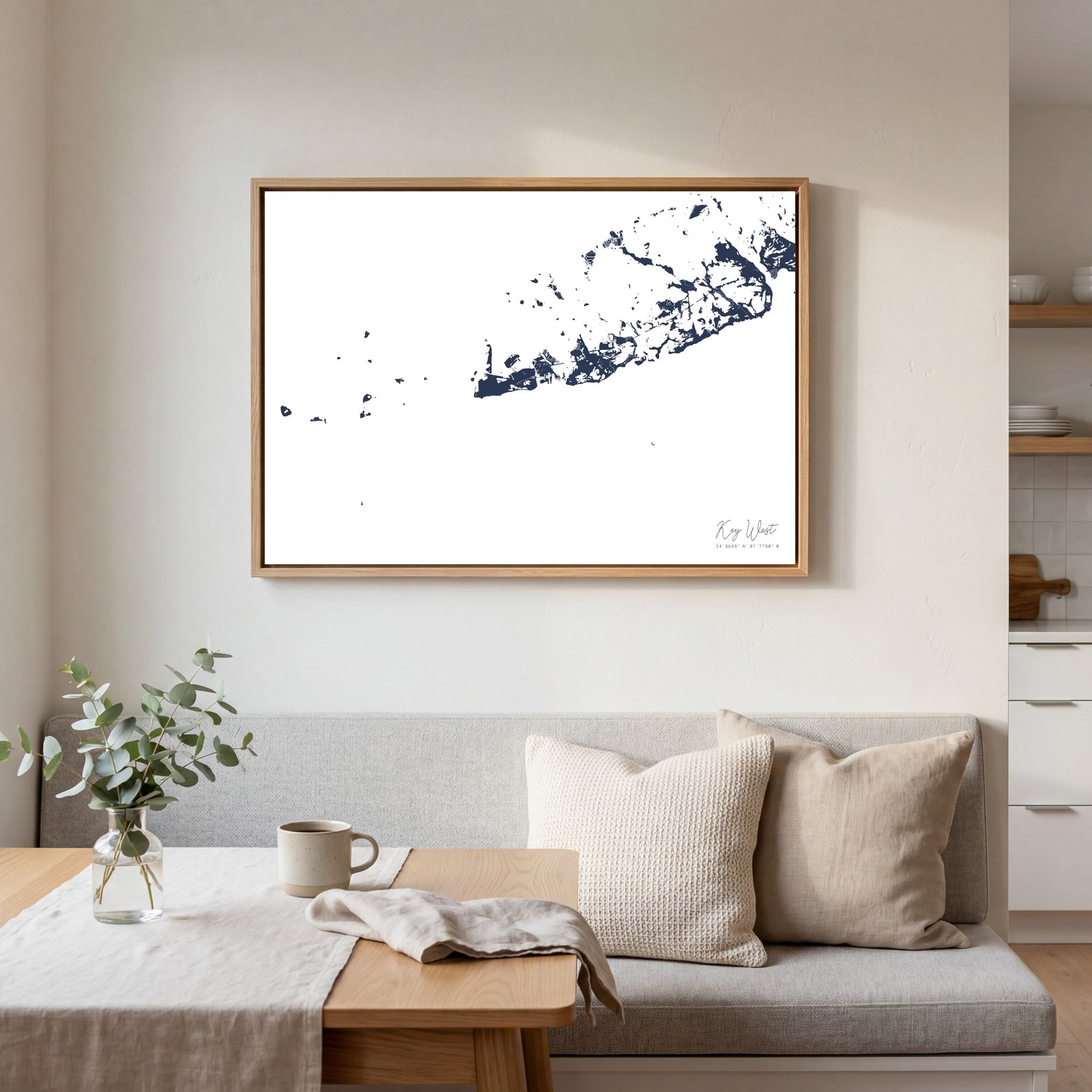 Key West navy horizontal canvas map in an oak framed room scene