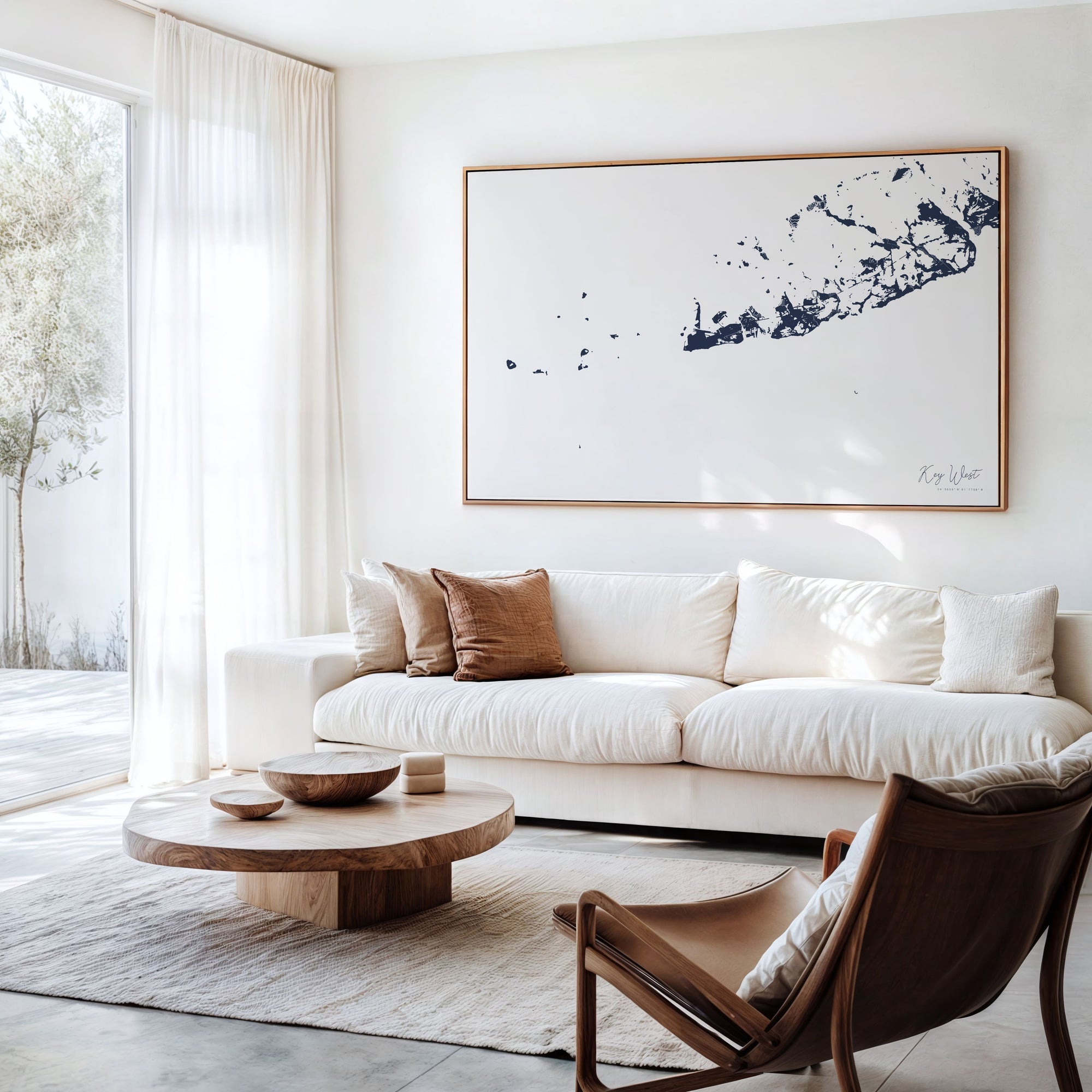 Key West navy horizontal canvas map in an oak framed room scene