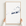 Key West canvas map — hands holding the canvas in an oak frame