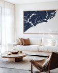 Kiawah Island navy horizontal canvas map in an oak framed room scene